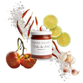 Jar of Tienda Salsita chili de arbol with chili peppers, limes, tomatoes, and garlic on a white background