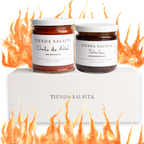 Two jars of Tienda Salsita hot sauce with flames around on a white background