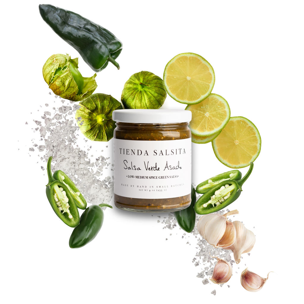 Jar of Tienda Salsita salsa verde with green peppers, limes, and garlic on a white background